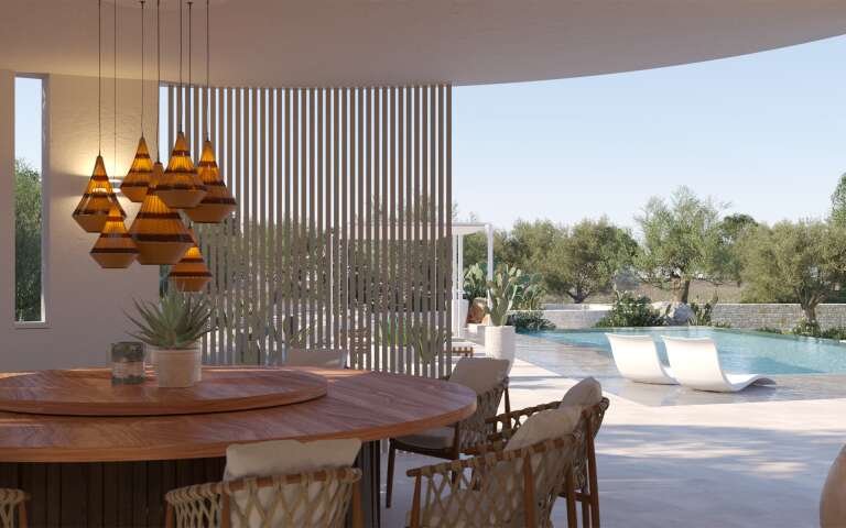 circular dining table by the pool