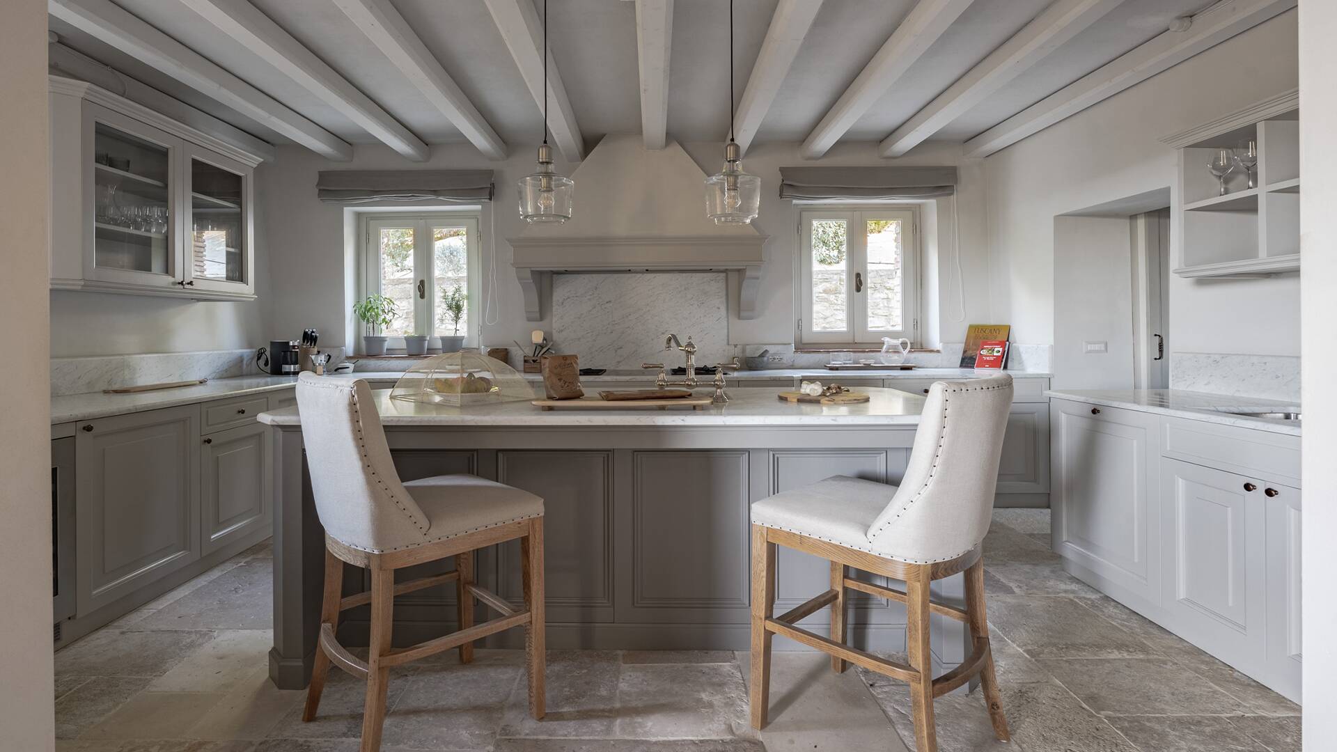 main villa, fully-equipped kitchen with counter and stools