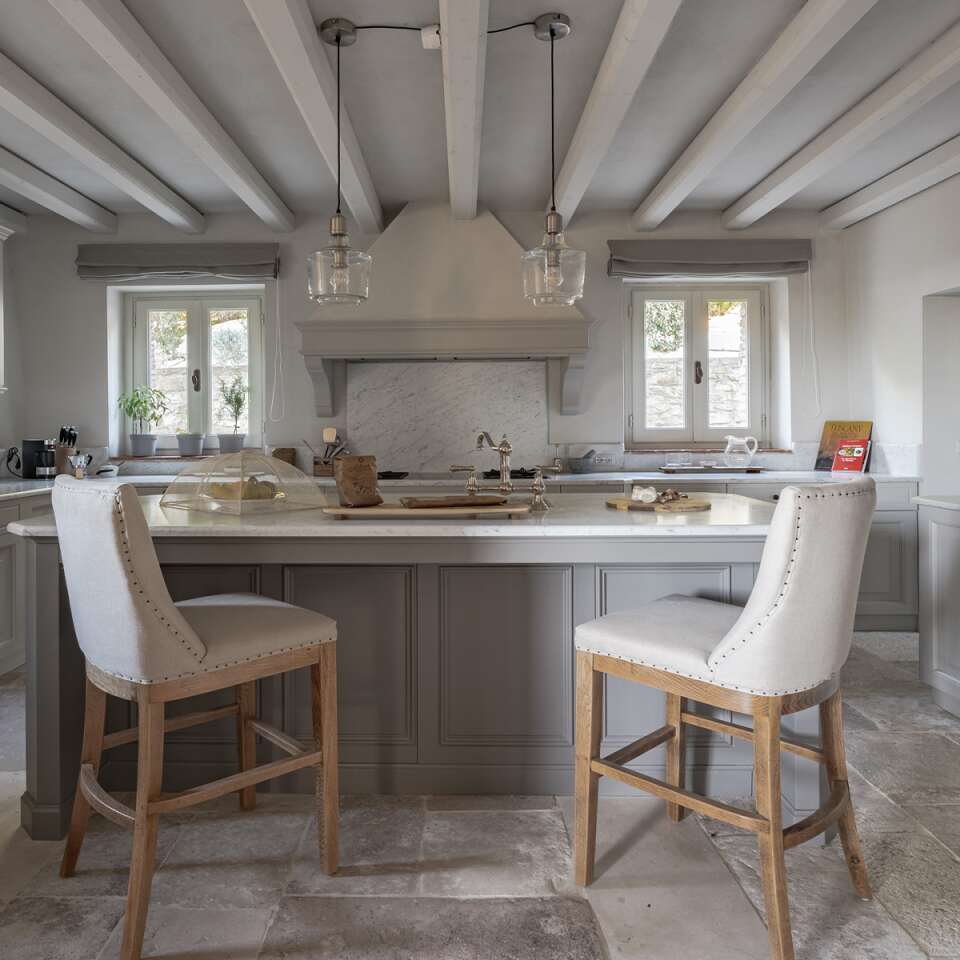 main villa, fully-equipped kitchen with counter and stools