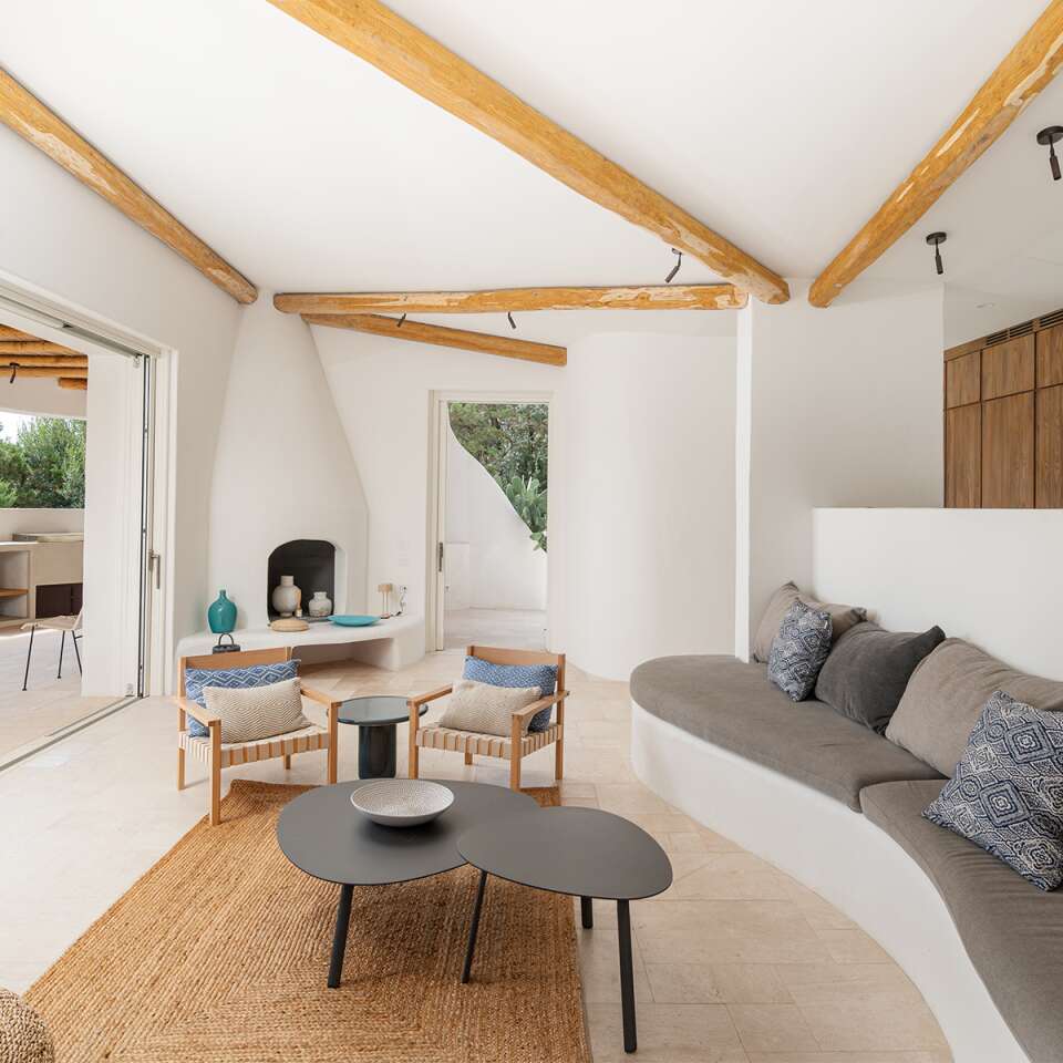 modern open space with living room and direct access to al fresco dining area