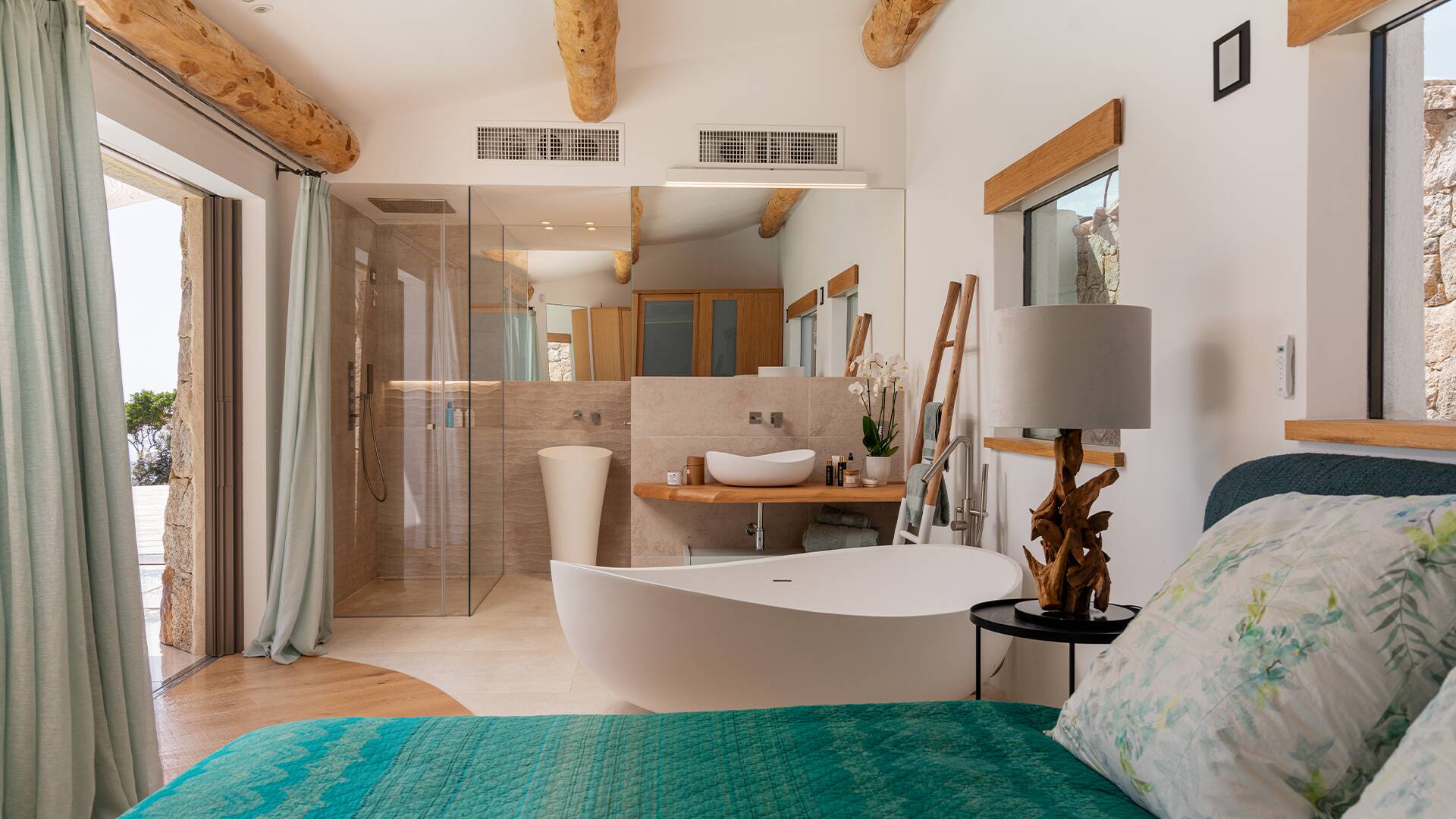 en suite bathroom with bath tub and shower cabin