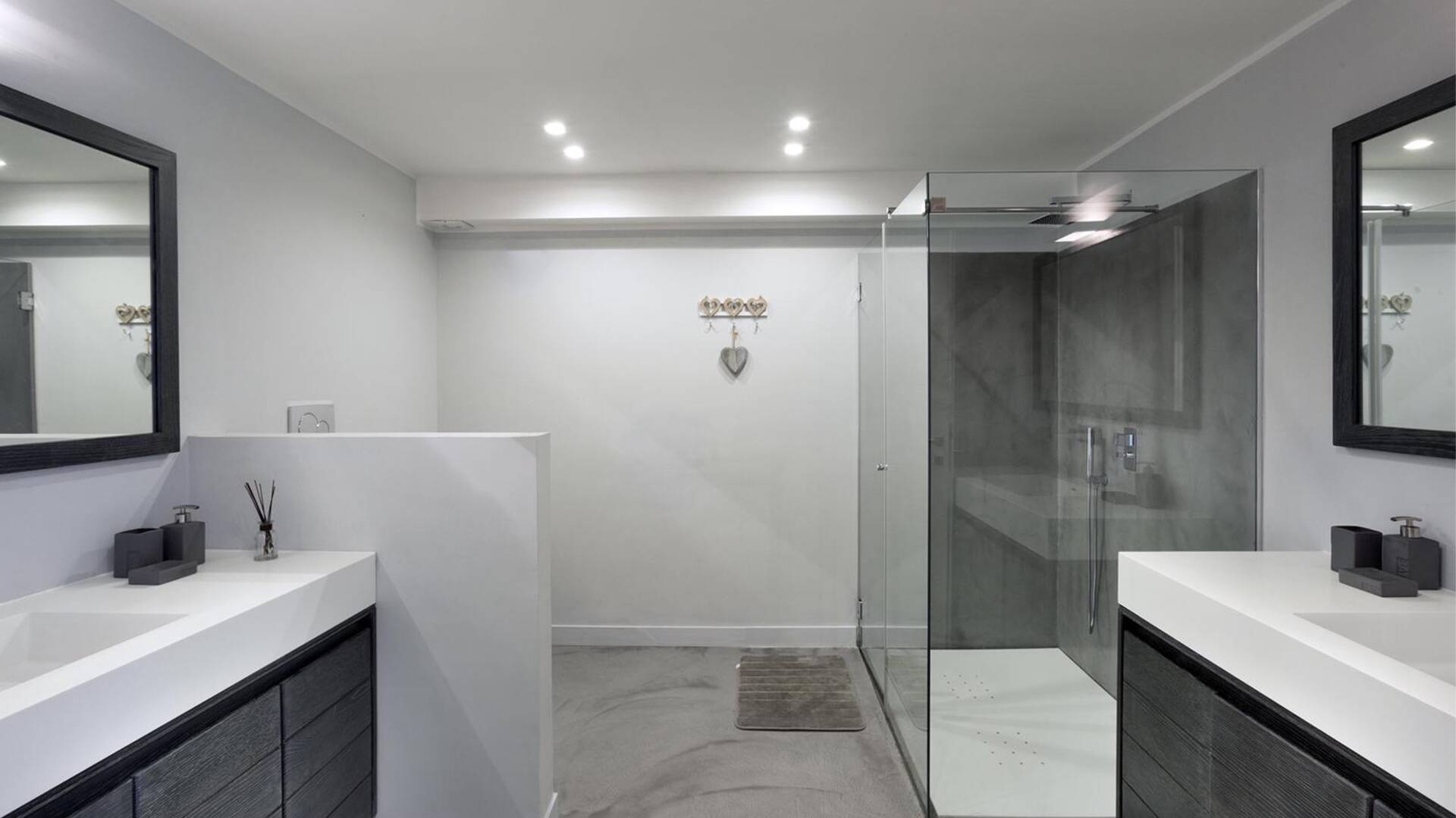 bathroom with shower cabin and double lavabo