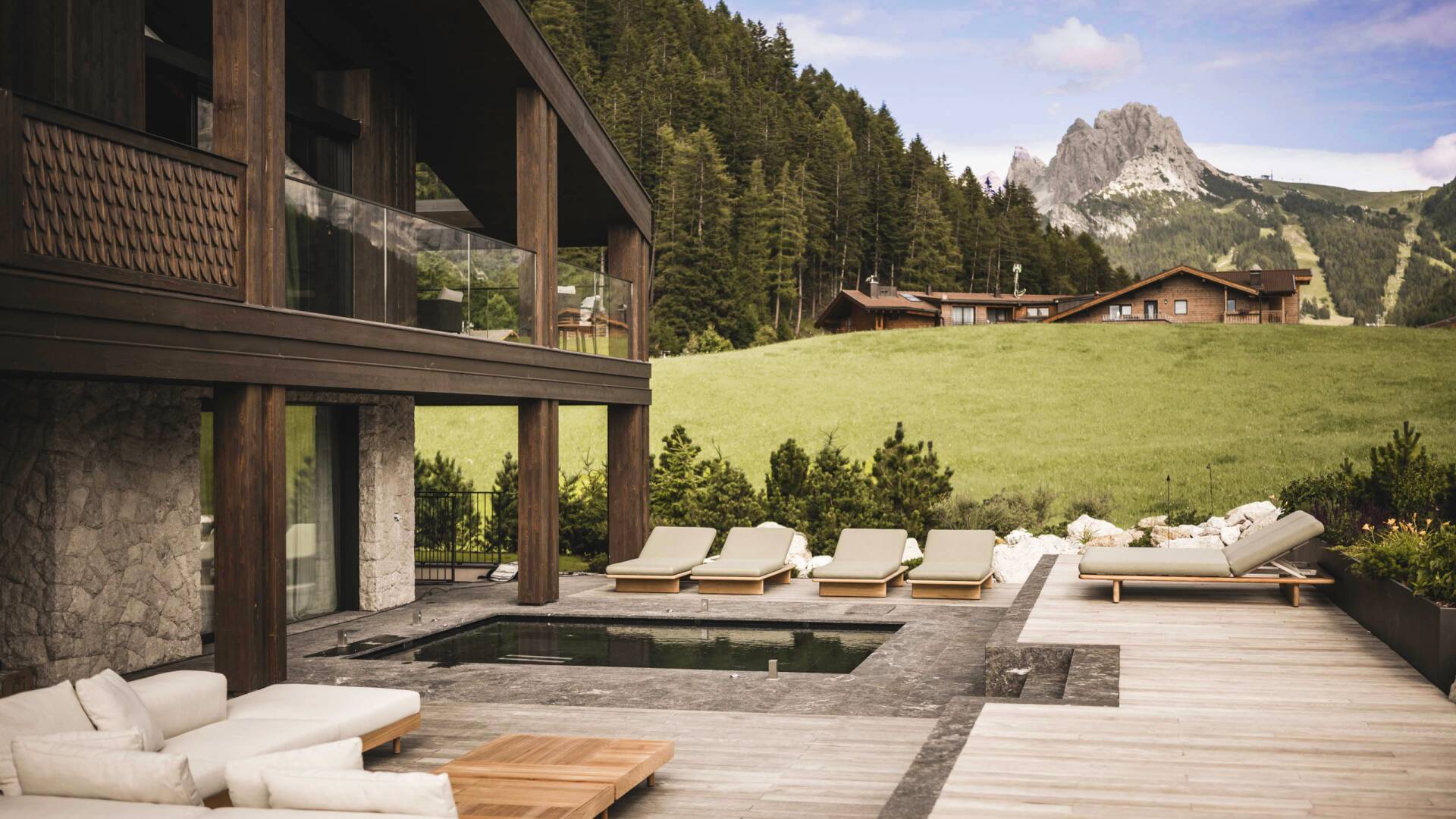sunbathing area with alpine views