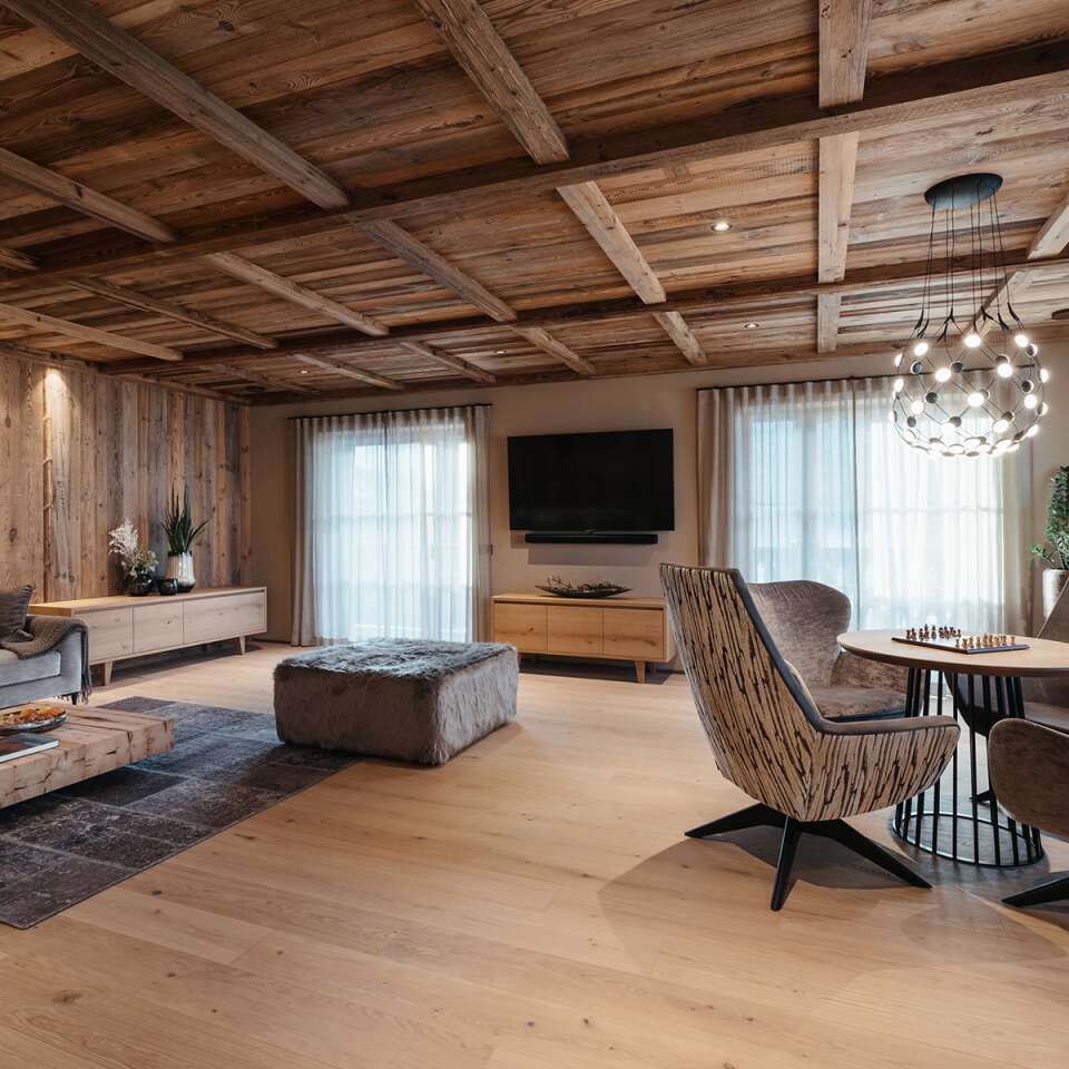 living room with sitting area and TV