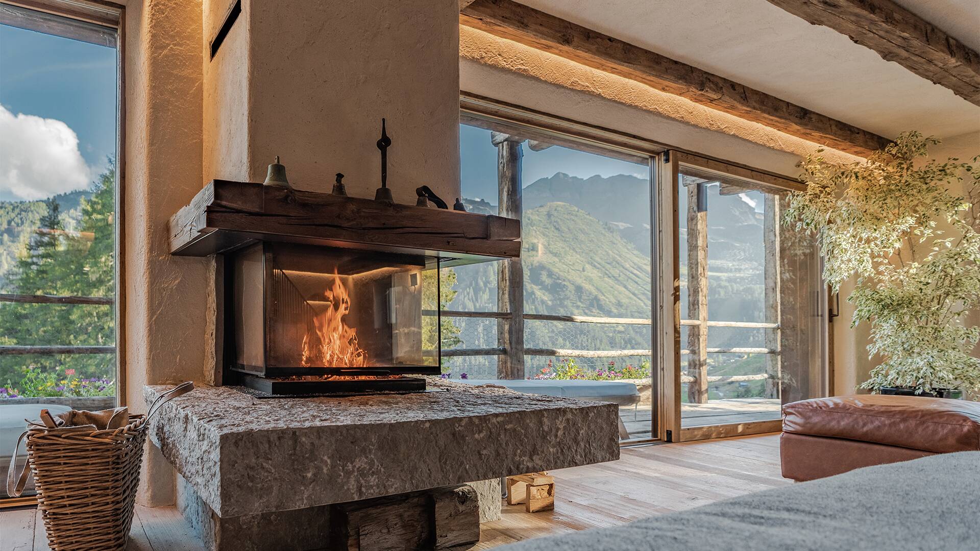 living room with fireplace and sweeping mountain vista