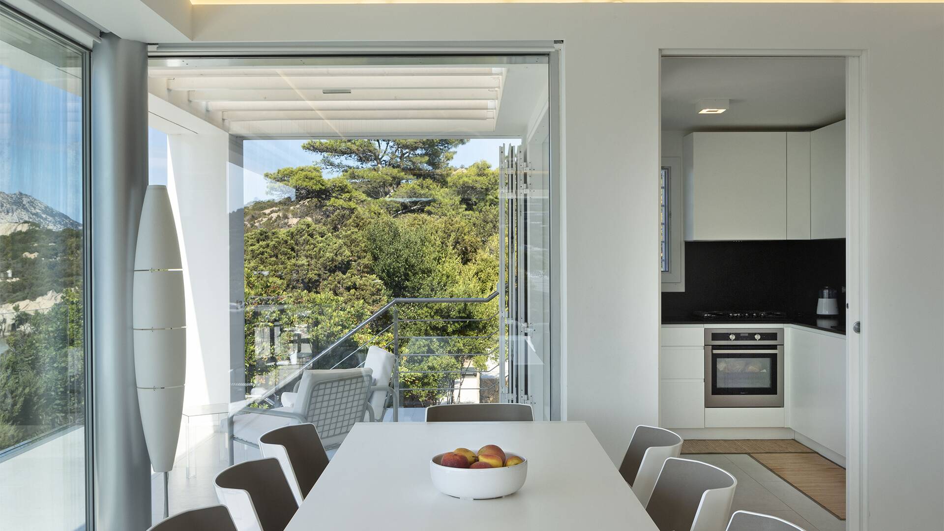 dining table and well equipped kitchen