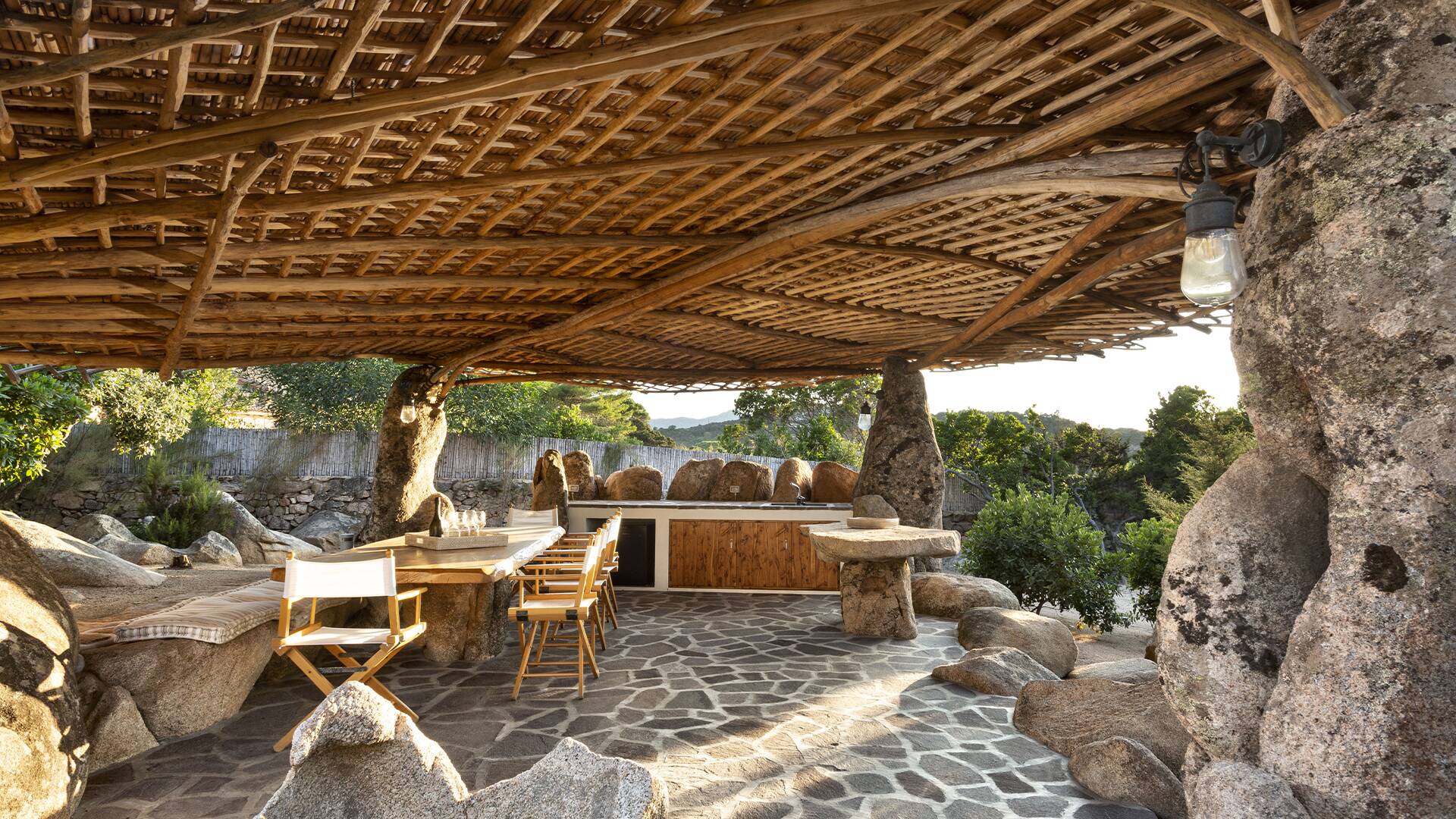 covered al fresco dining area with outdoor kitchen