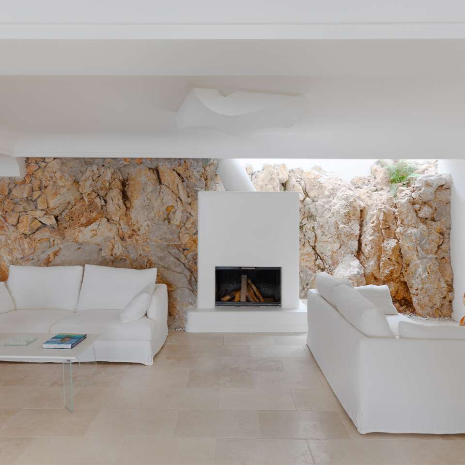 living room with fireplace and TV