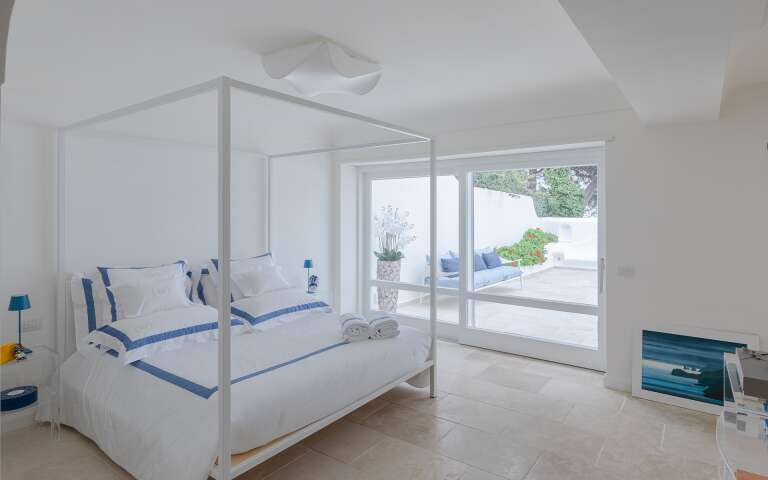 luxury double bedroom with direct access to outdoor