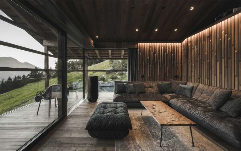 iconic living room with French windows and sweeping view