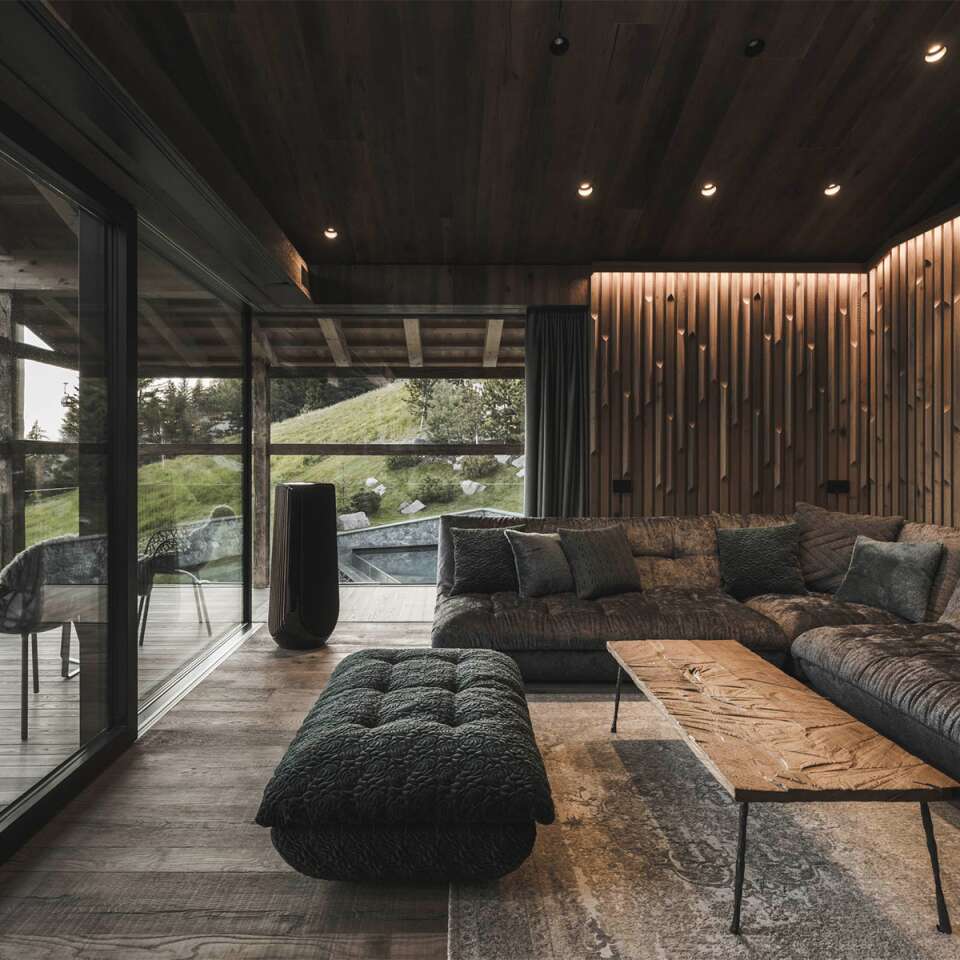 iconic living room with French windows and sweeping view
