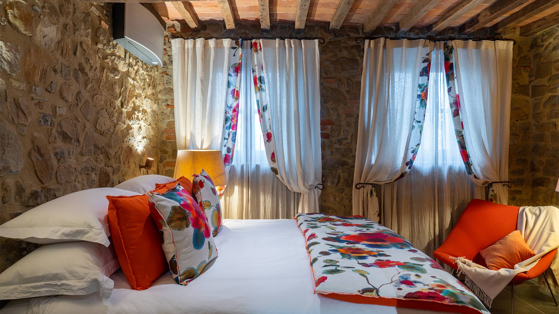 double bedroom with authentic Tuscan walls