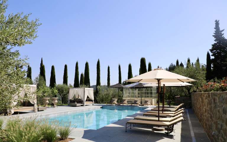 private swimming pool with sunbathing area