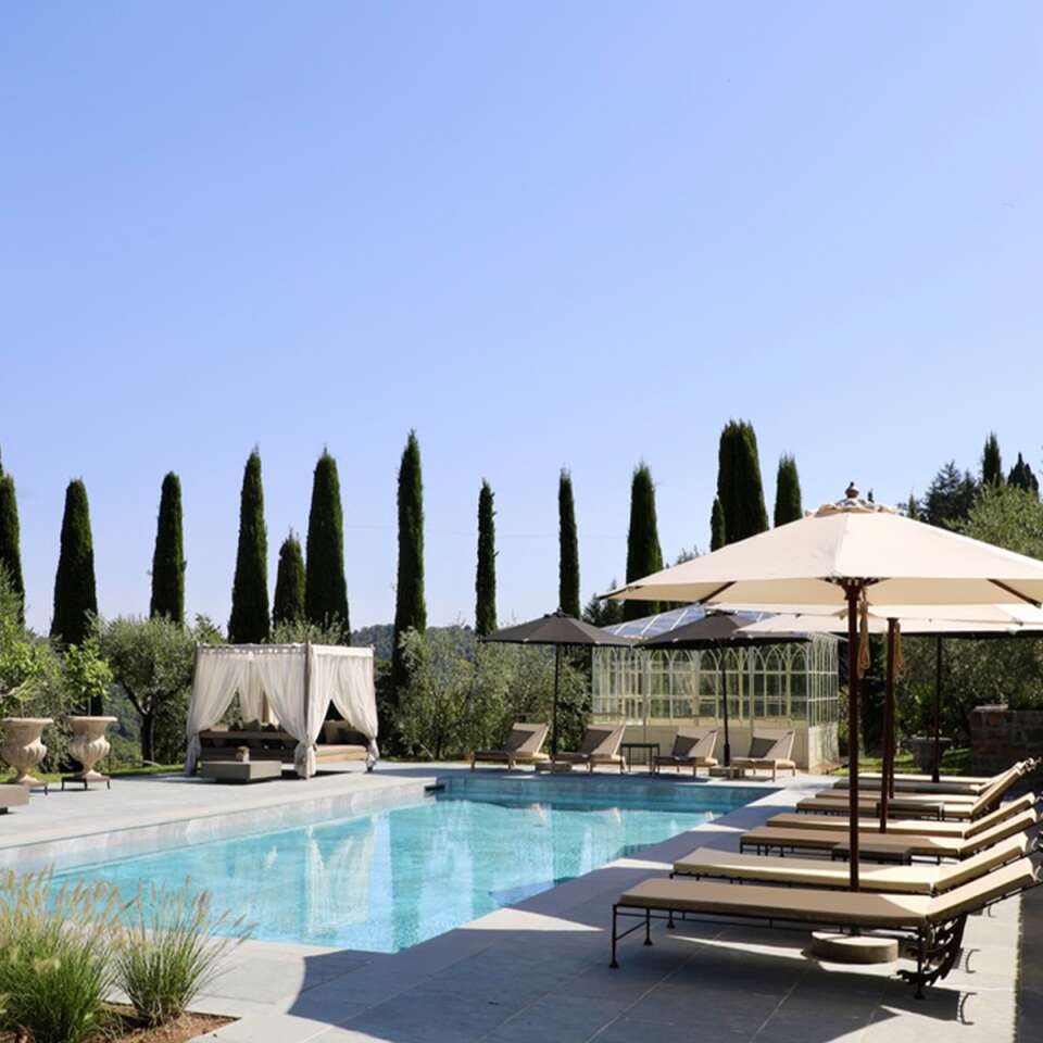 private swimming pool with sunbathing area