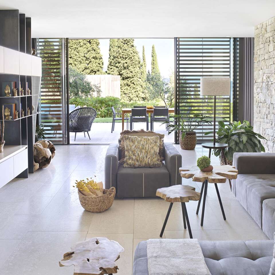 modern living room with TV and direct access to outdoor