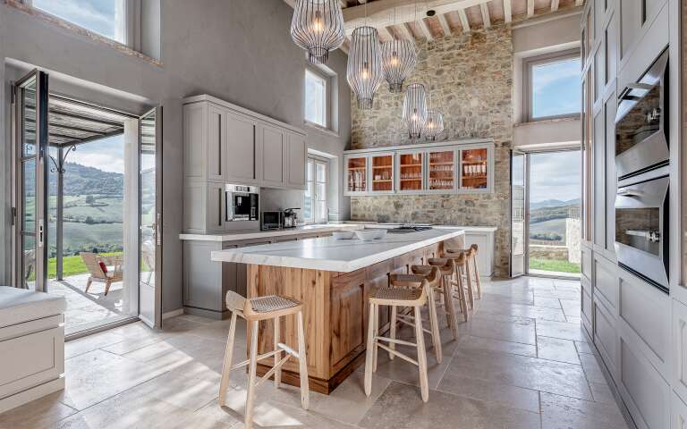 kitchen island with stools and direct access to outdoor