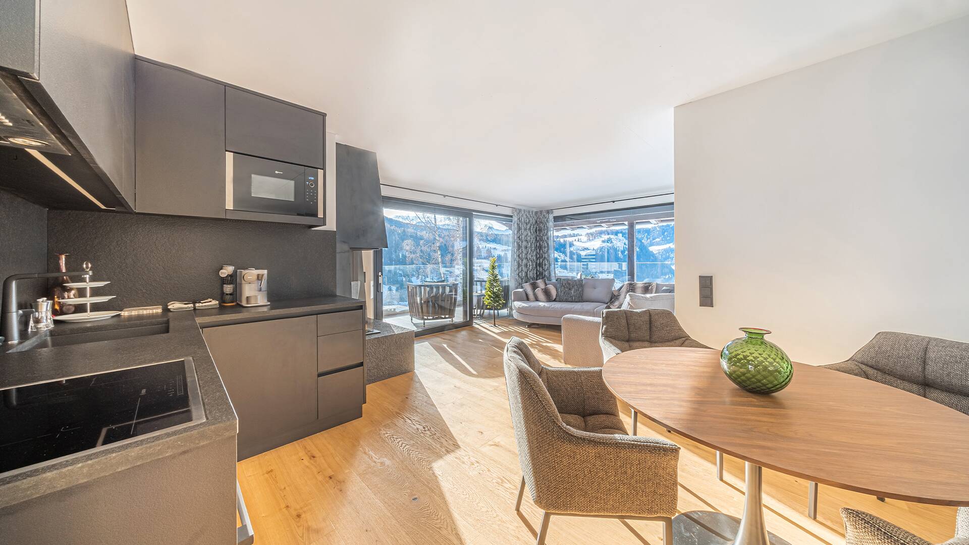 first floor, modern open space with kitchen and living area