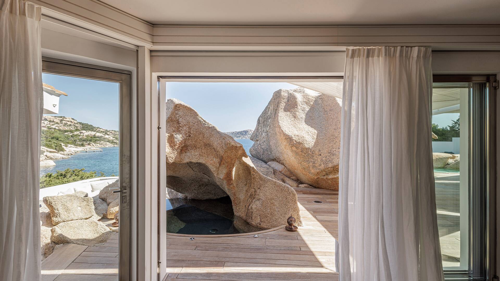 sea view and pool with local rocks