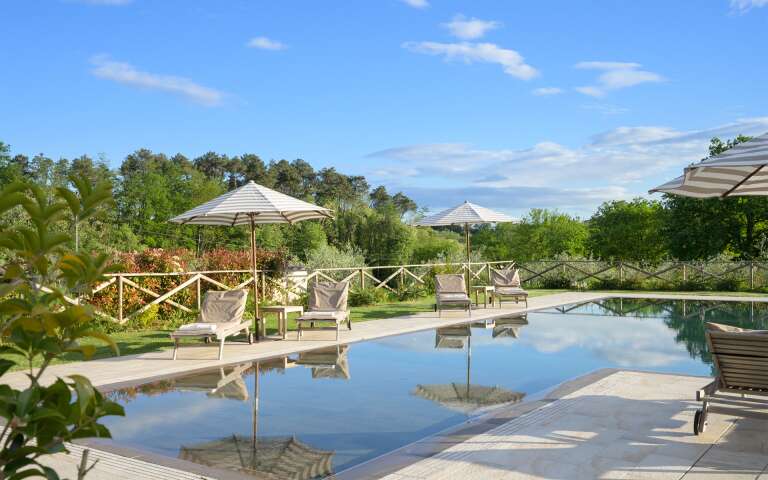 infinity swimming pool immersed in the countryside