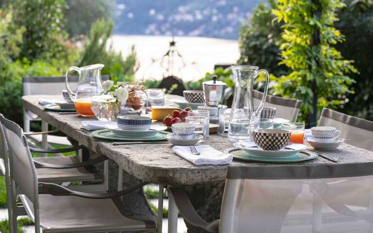 alfresco dining area with lake view 