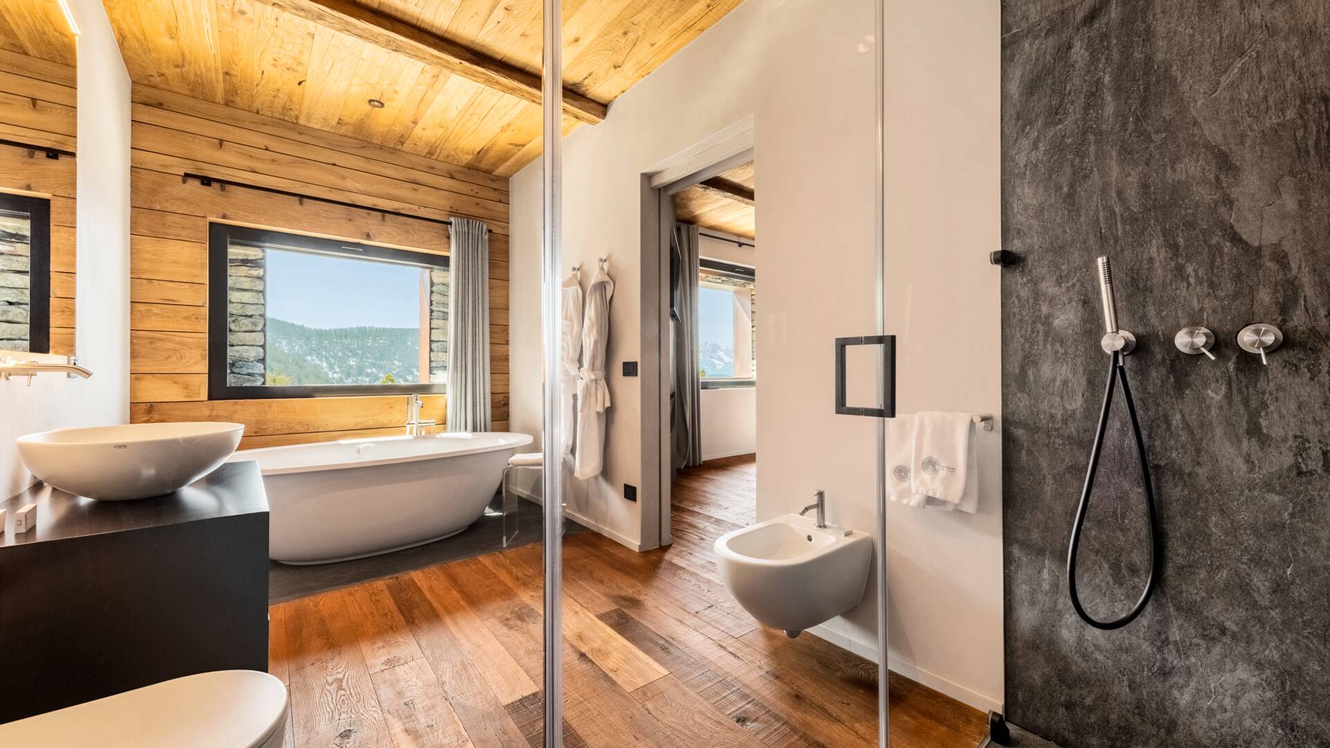 en suite bathroom with bath tub and walk-in shower
