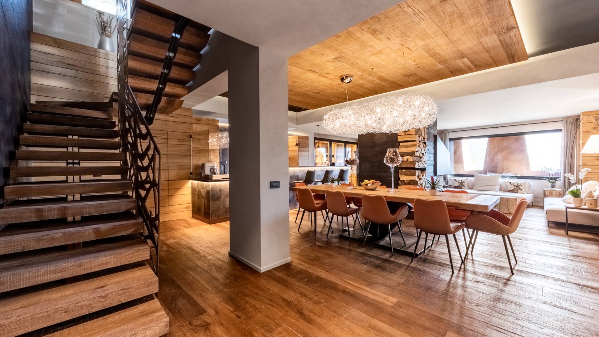 fully equipped kitchen, living room and dining area