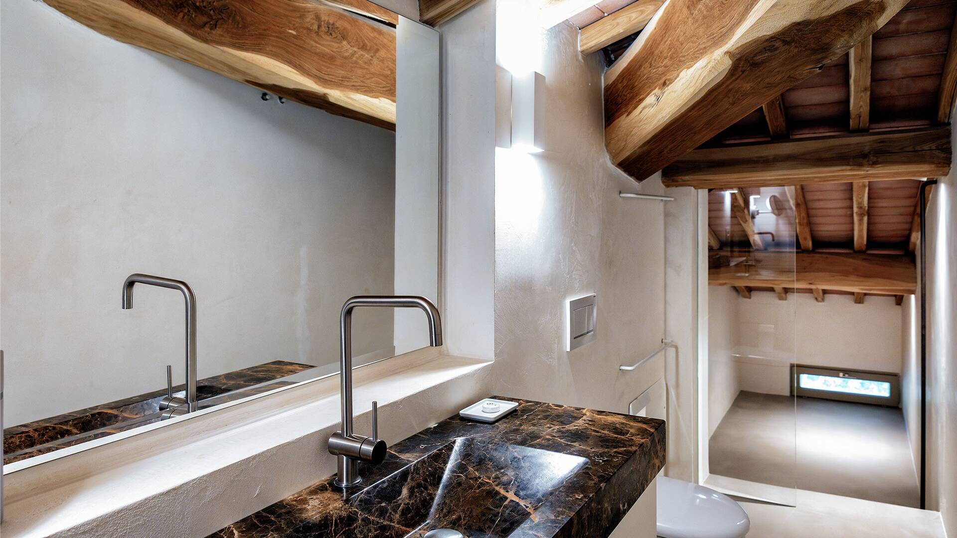 main villa, second floor, en suite bathroom with low ceiling