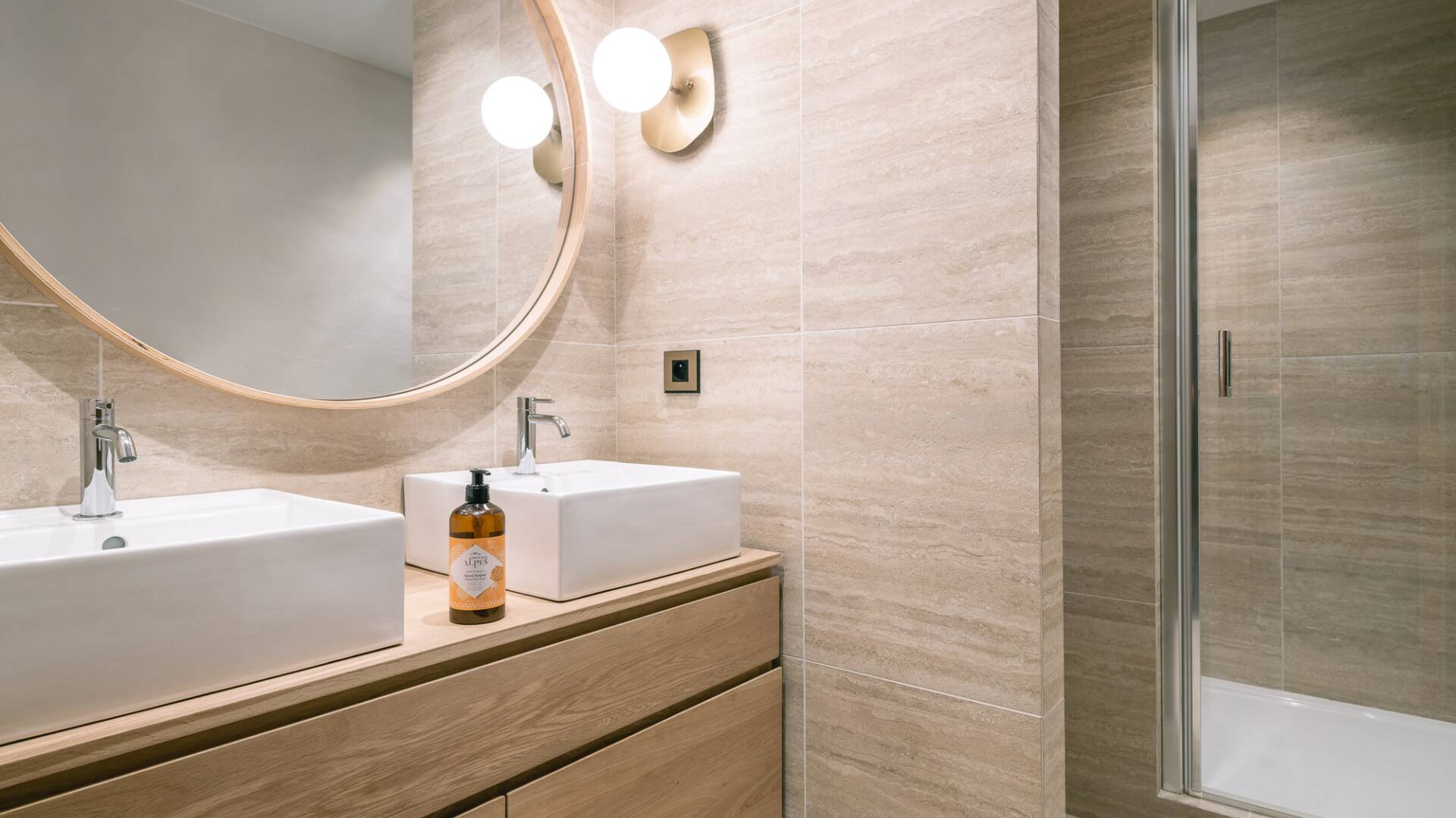 en suite bathroom with double lavabo