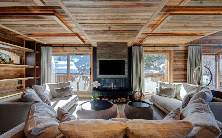 living room with TV and fireplace