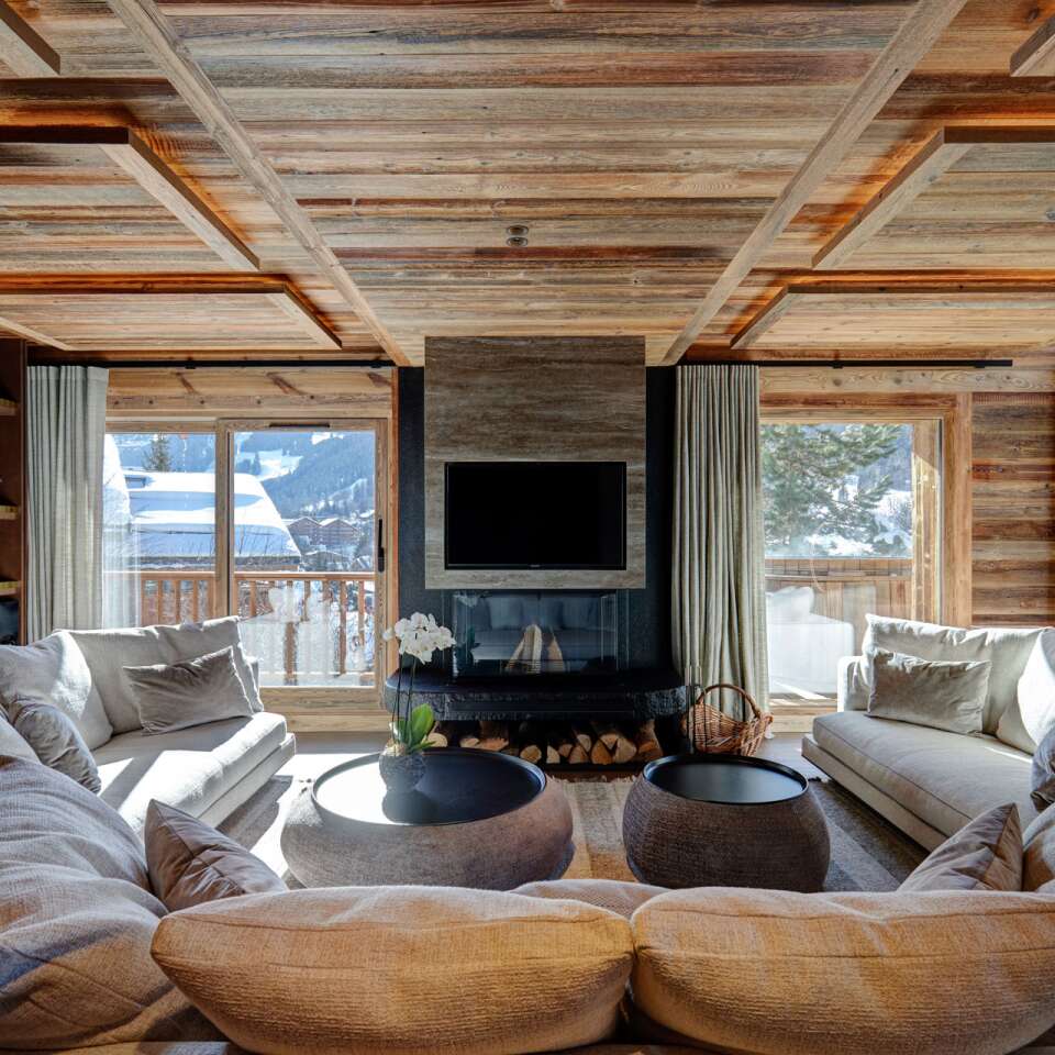 living room with TV and fireplace