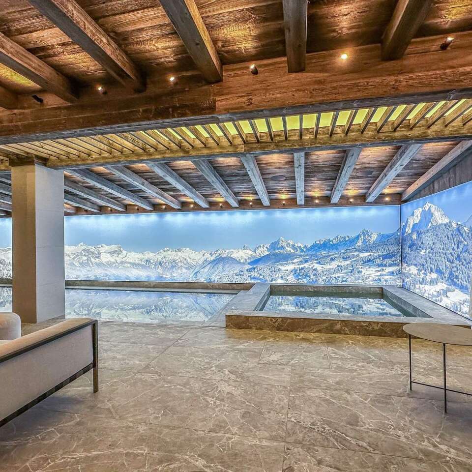 luxury indoor pool with sunbeds