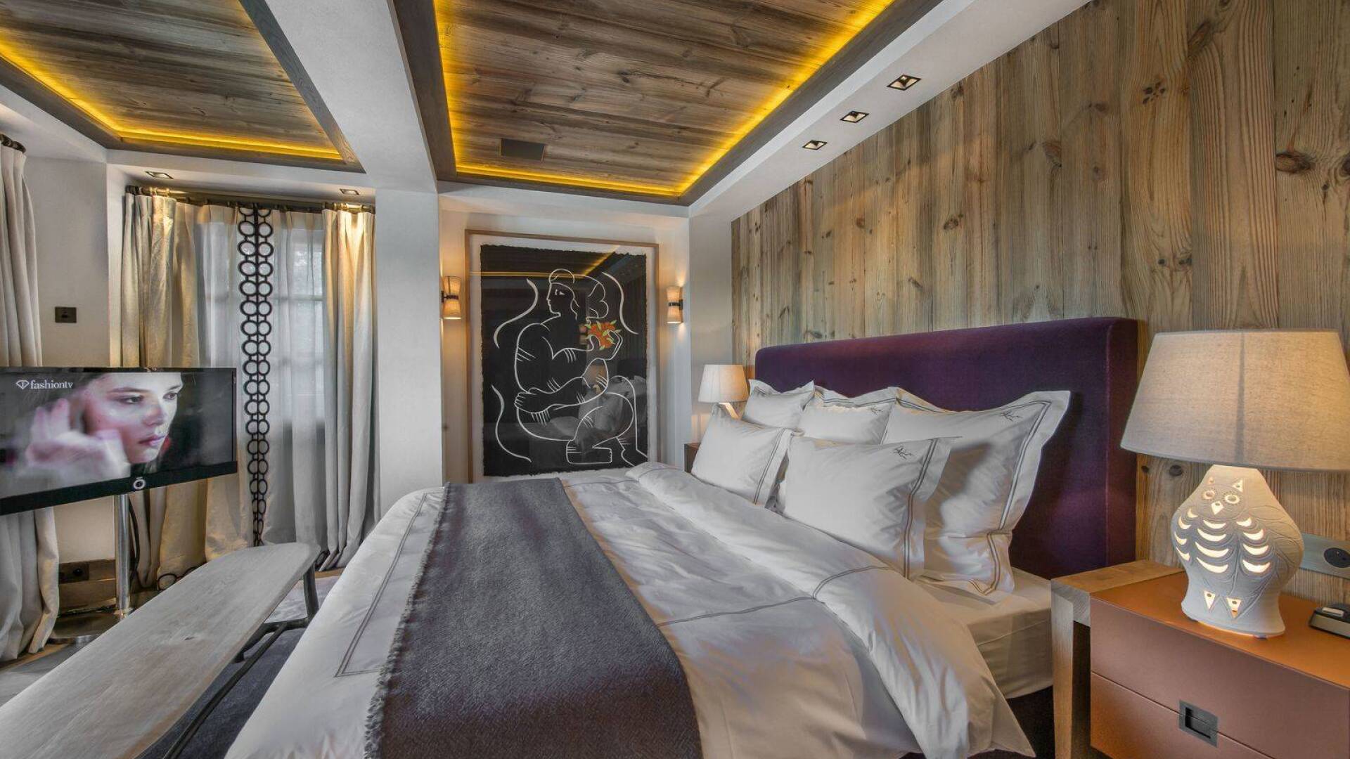 luxury double bedroom with TV