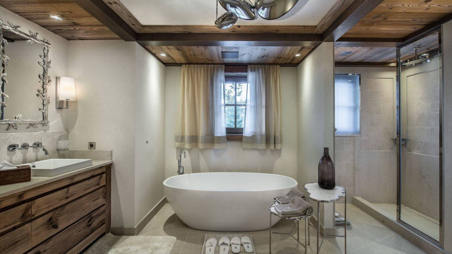 en suite bathroom with bath tub and walk-in shower