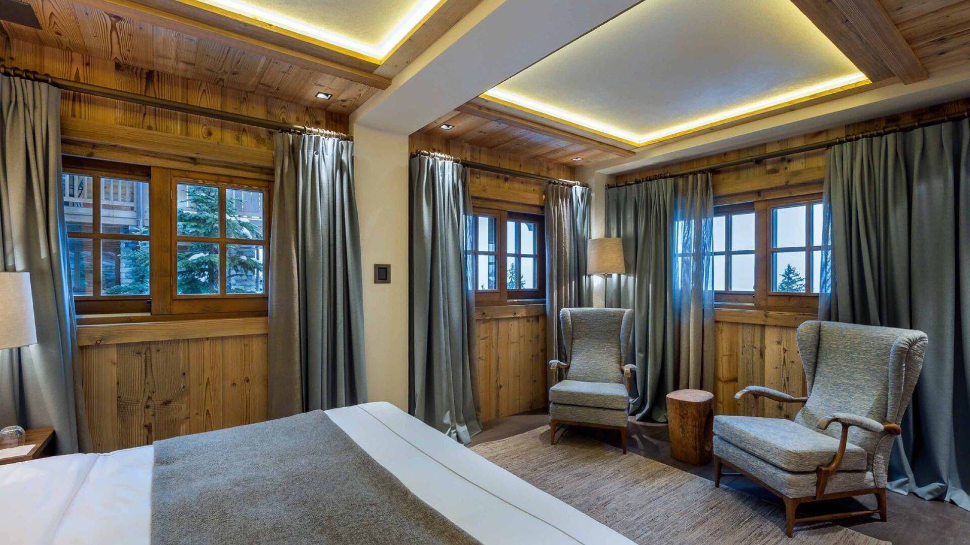 luxury double bedroom with sitting area