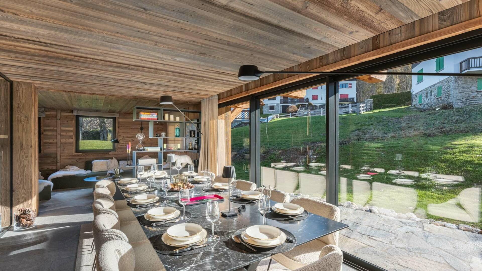 dining area brightened by majestic French windows