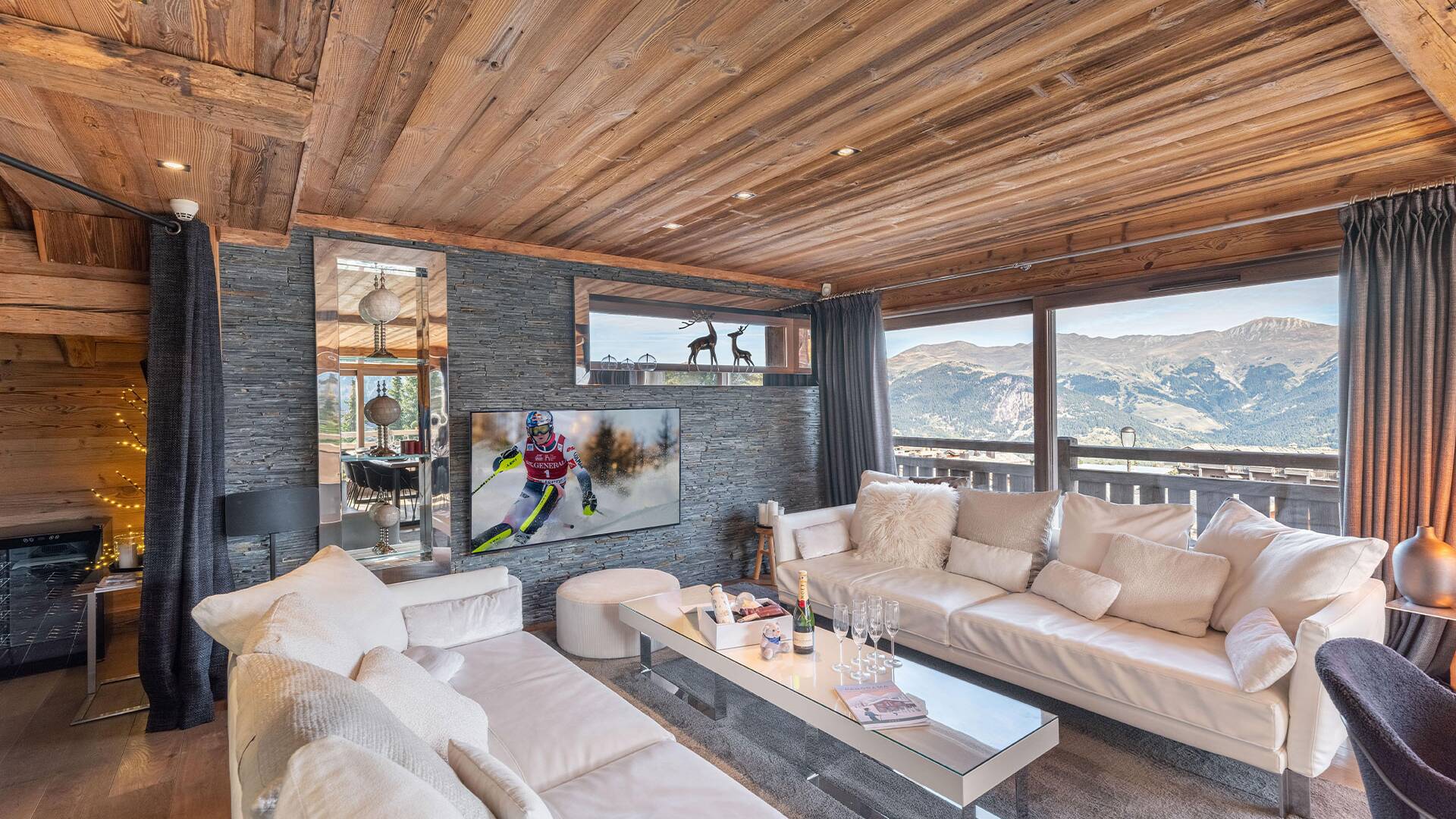 living room with French windows and TV