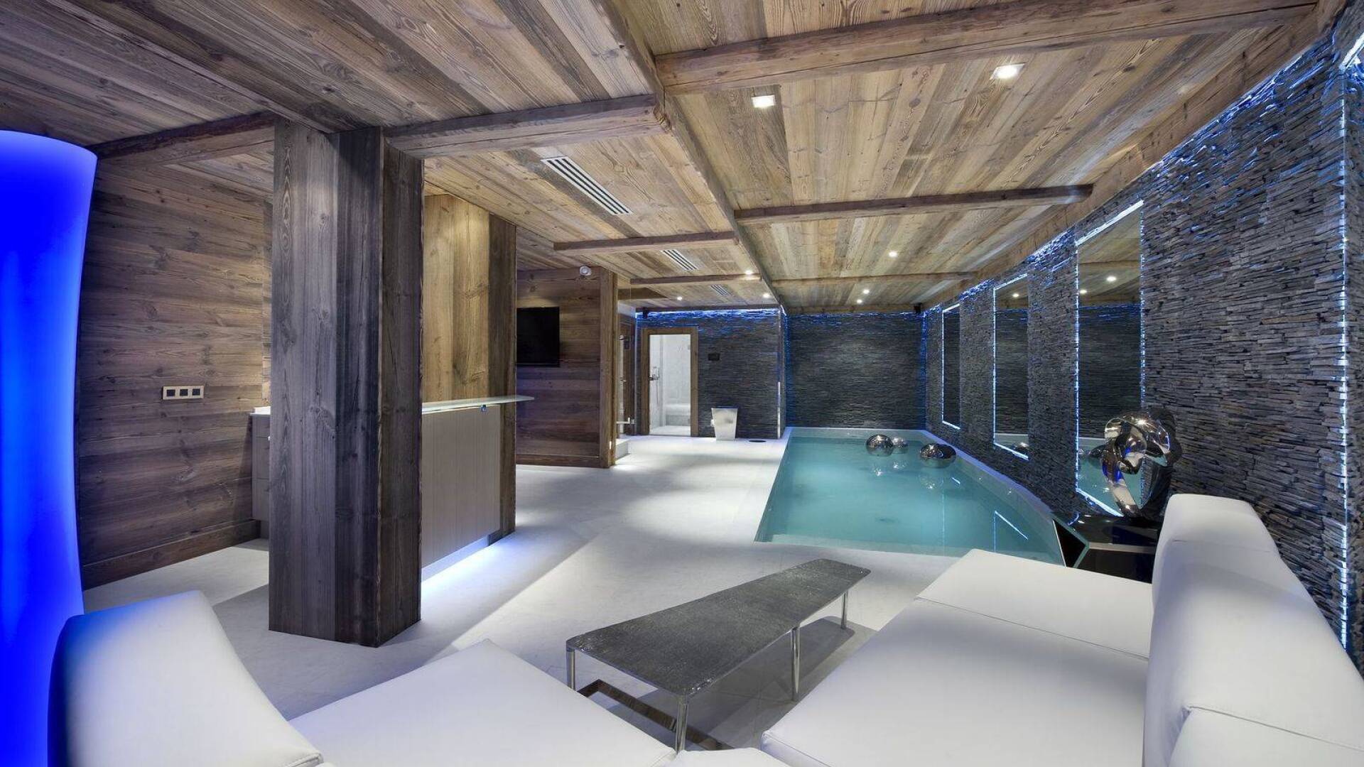 indoor pool with minimal lounge area