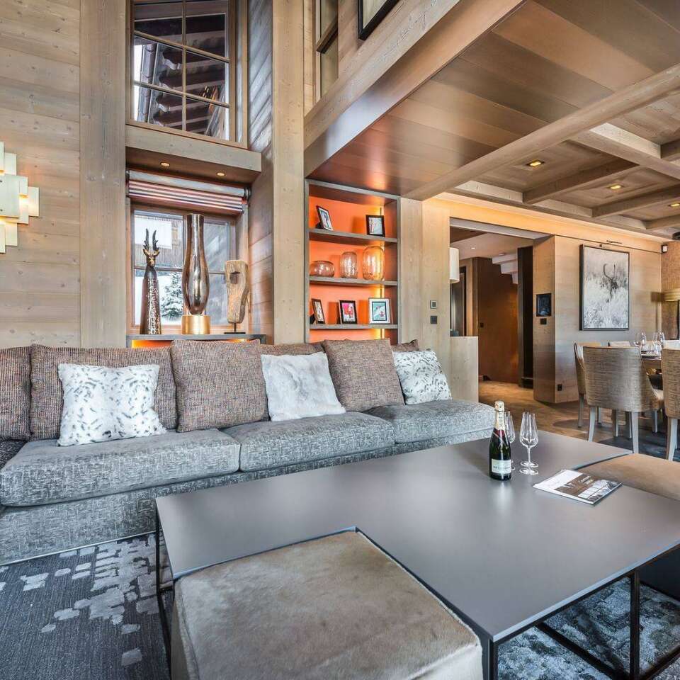 luxury sitting area with L-shaped sofa and coffee table