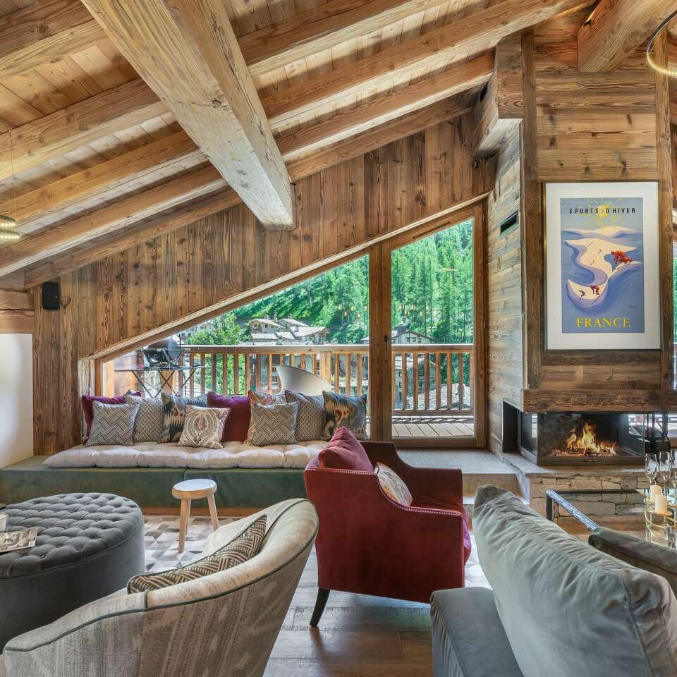 living room with fireplace and French windows