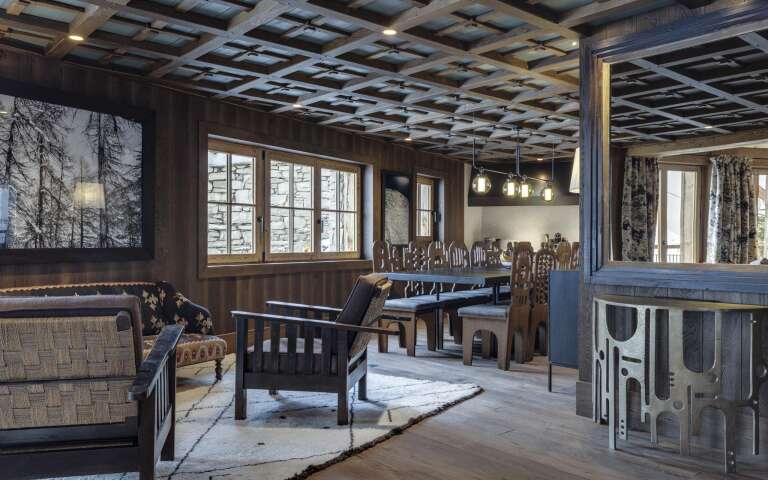 sitting and dining area with wooden traditional furniture