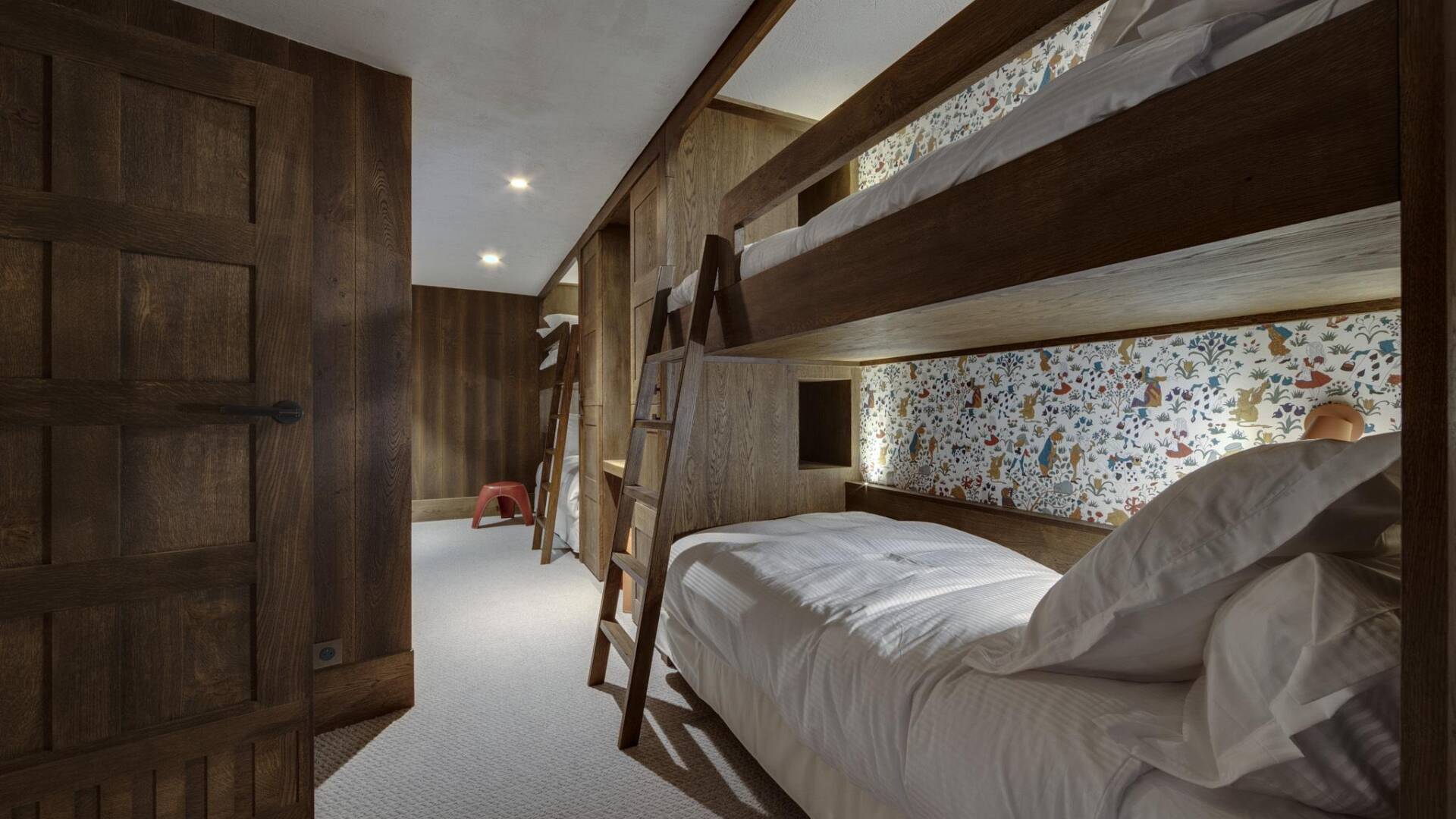 quadruple bedroom with 2 sets of bunk beds
