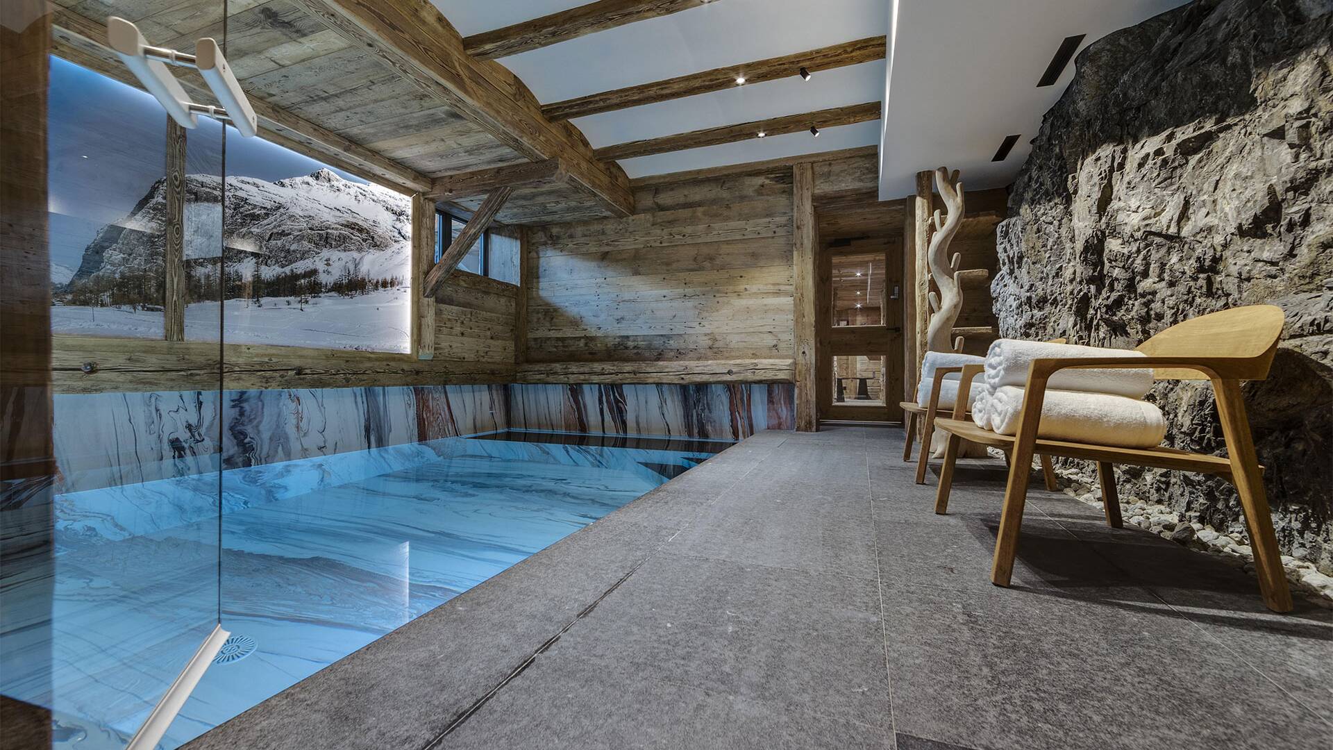 indoor pool with lounge area