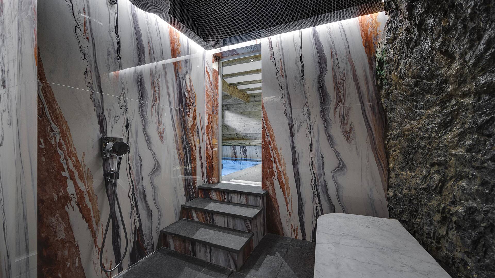 wellness area, marble shower
