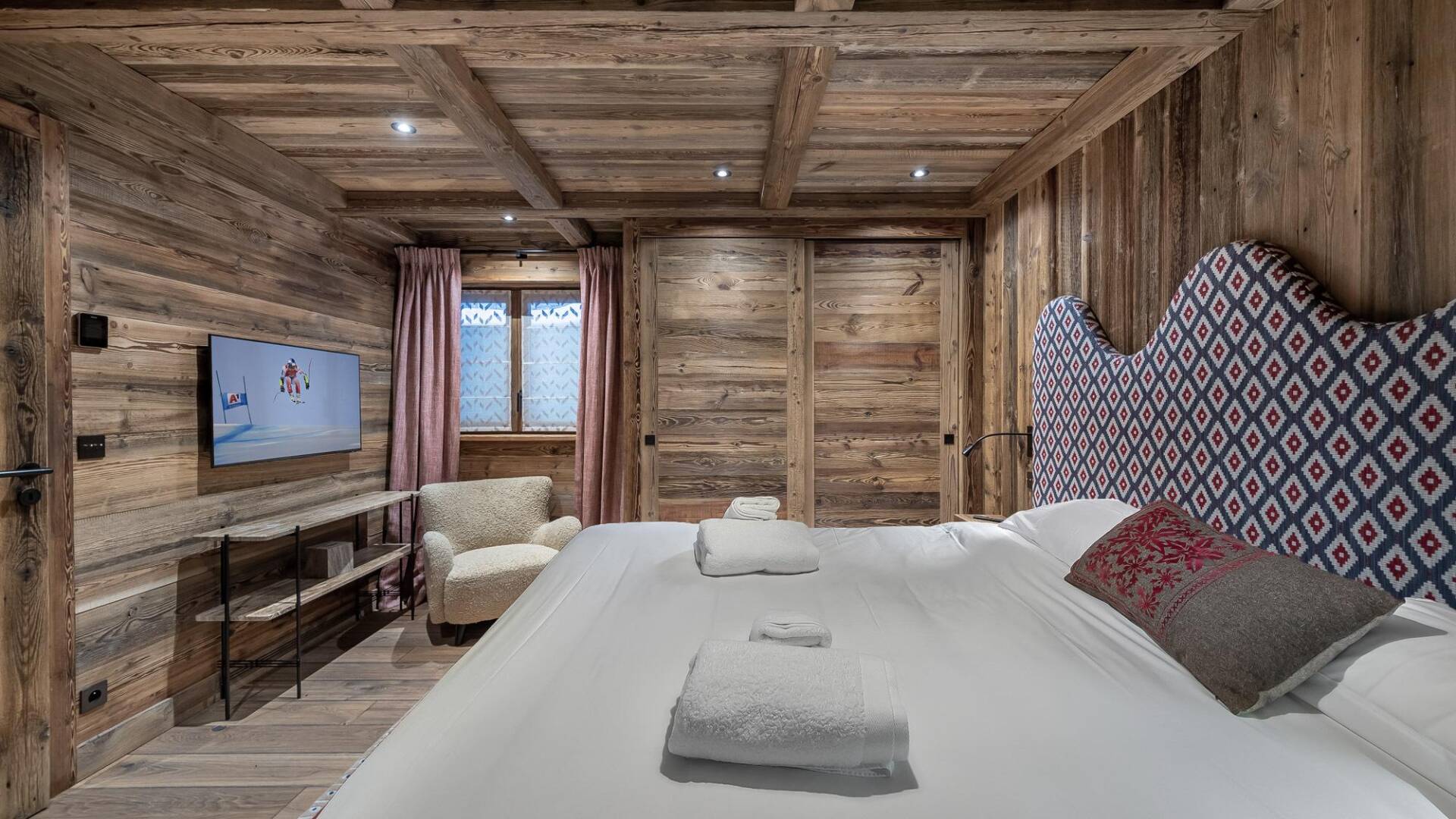 double bedroom with TV
