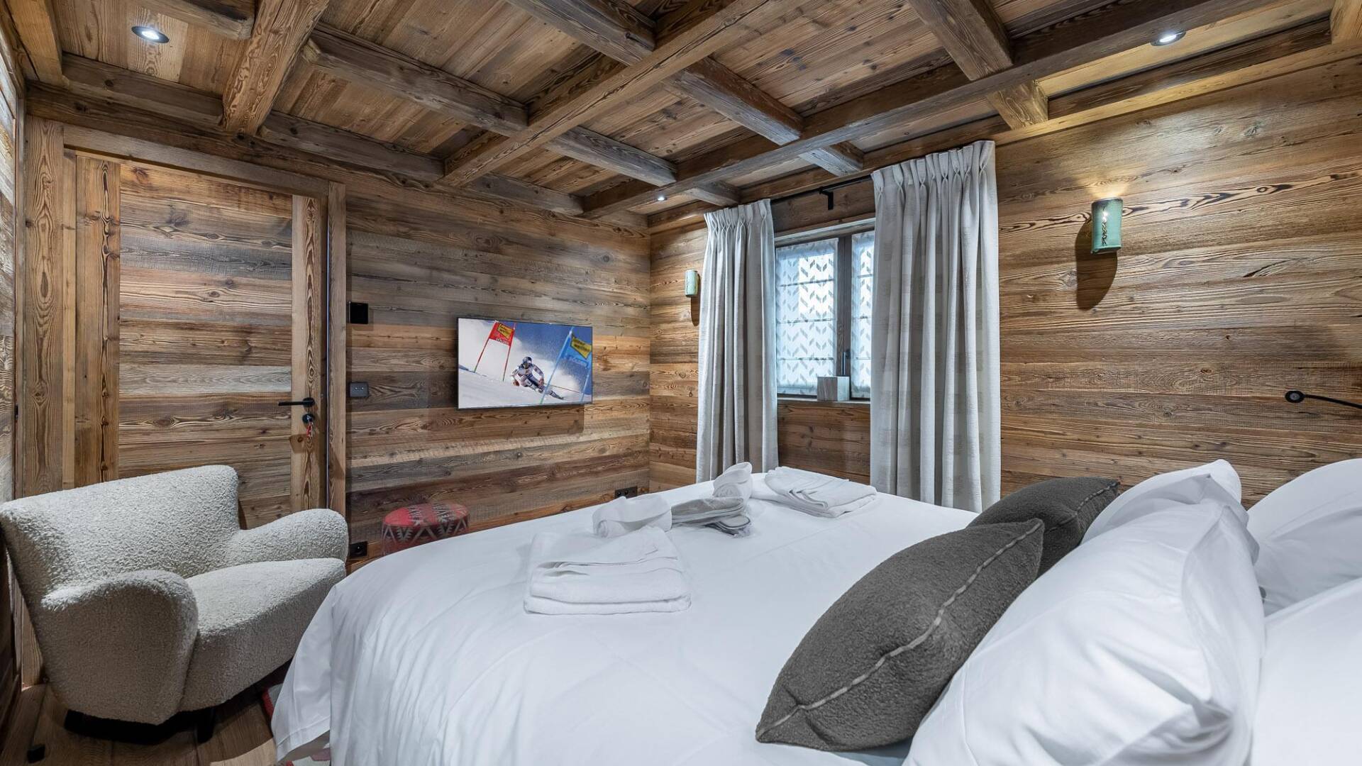 double bedroom with TV