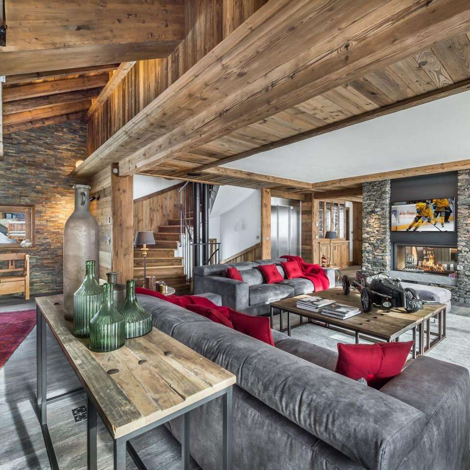 elegant living room with piano and fireplace