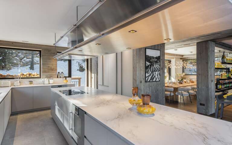 fully-equipped marble gourmet kitchen