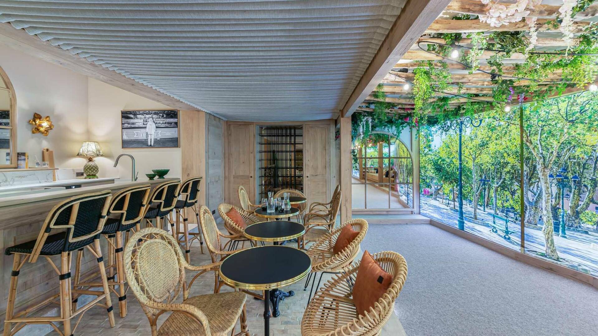 covered outdoor bar with top counter and stools