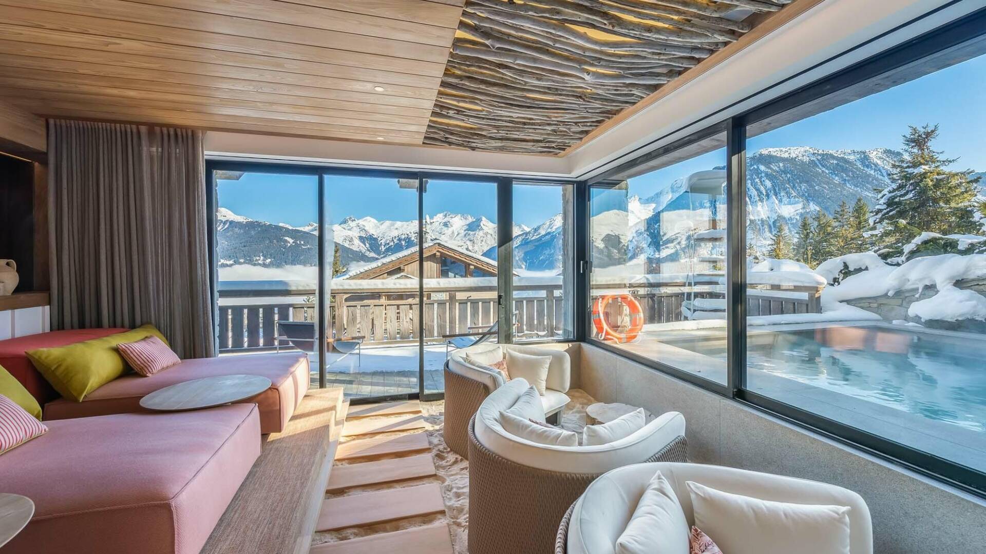 luxury indoor/outdoor heated pool with exclusive lounge area
