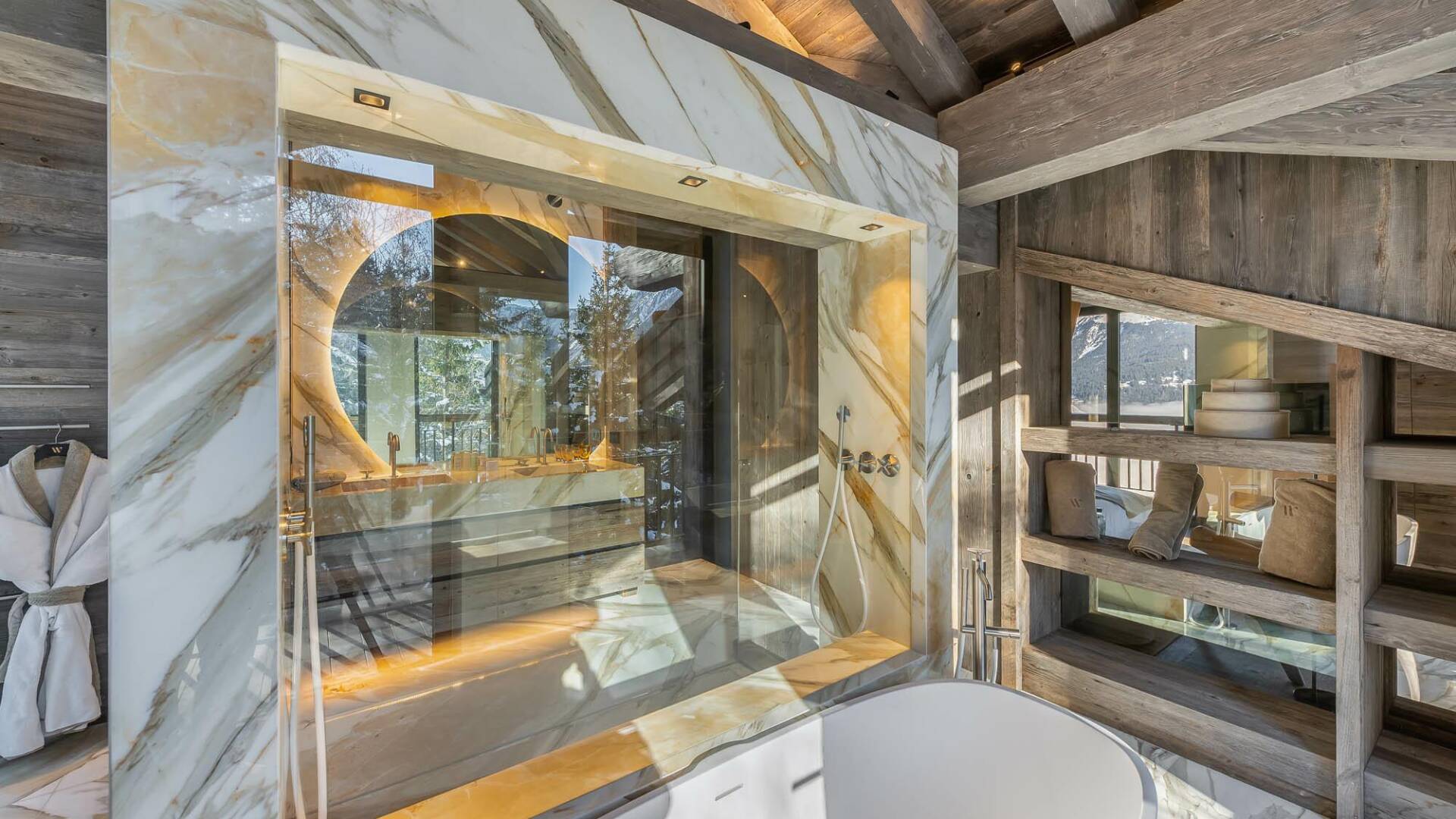 en suite luxury marble bathroom with double walk-in shower and bath tub